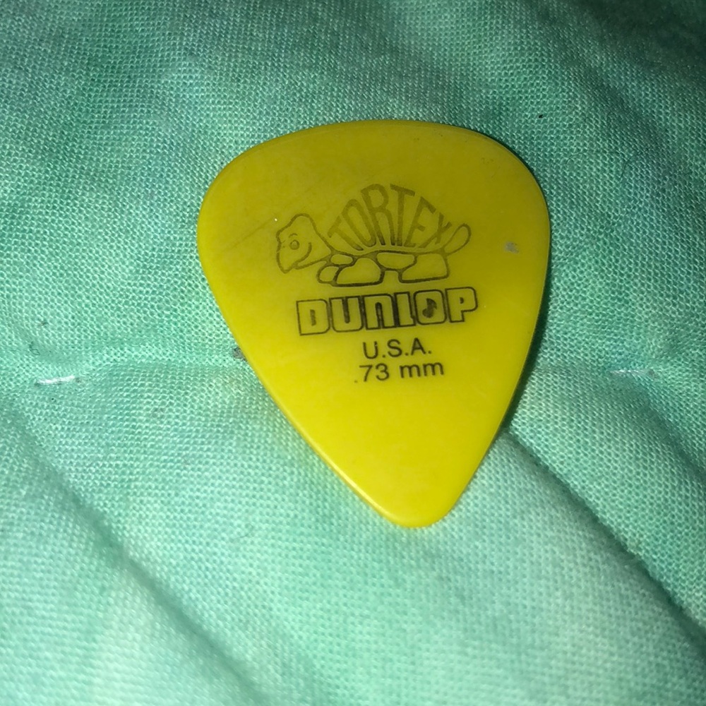 Yellow guitar pick